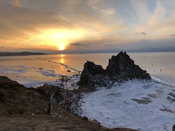 Scenic view of sea against sky during sunset