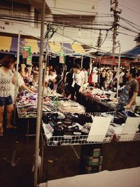 People at market stall