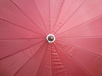 Low angle view of red ceiling