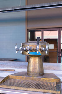 Close up of draft beer dispenser
