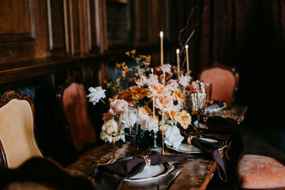 Close-up of flowers on table at home