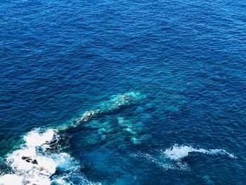 High angle view of blue sea