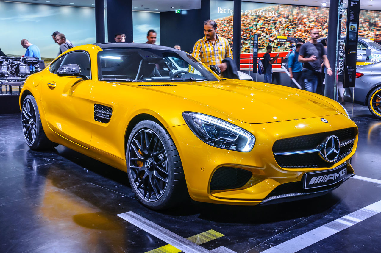 YELLOW CAR ON ROAD