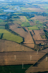 Aerial view of windmills on landscape