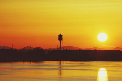 Scenic view of sunset over river