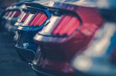 Close-up of cars in parking lot