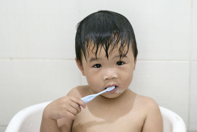 Portrait of boy with toothbrush