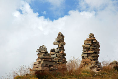 Low angle view of stack of building against sky