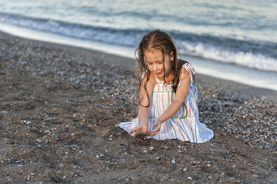 Girl on shore at beach