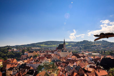 Aerial view of townscape against sky