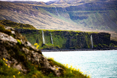 Scenic view of sea and mountains
