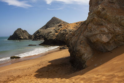 Scenic view of beach against sky