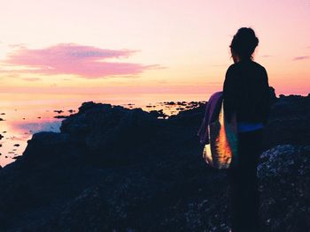 Scenic view of sea at sunset