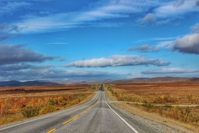 Country road passing through landscape