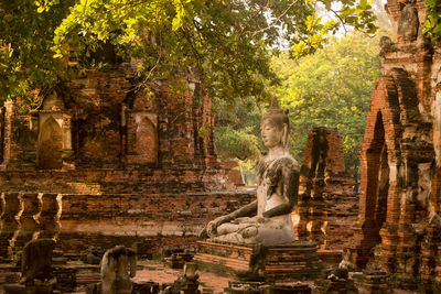 Old buddha statue at wat yai chai mongkhon