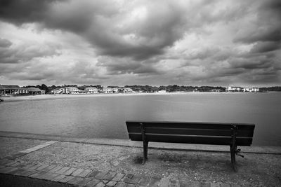 Scenic view of sea against storm clouds