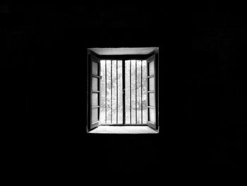 Closed window in dark room