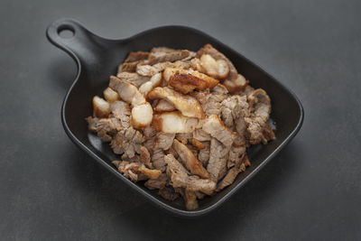 High angle view of meat in bowl on table