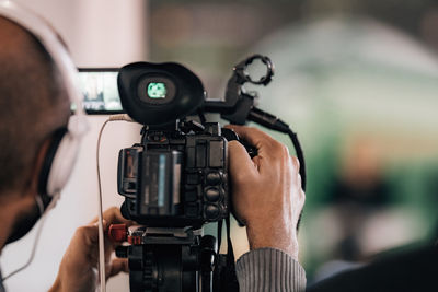 Cameraman recording a media event