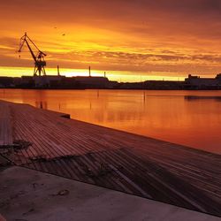 Scenic view of silhouette pier against sky during sunset