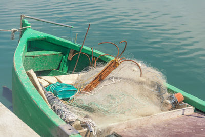 High angle view of fishing boat moored at lake