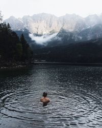 Man swimming in lake