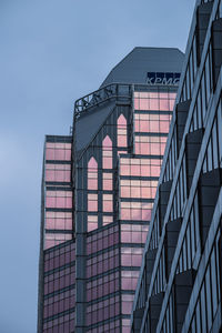 Low angle view of modern building against clear sky