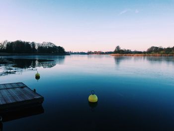 Scenic view of lake against clear sky