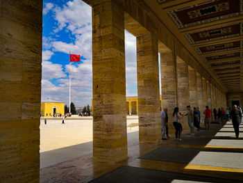 People in front of historic building