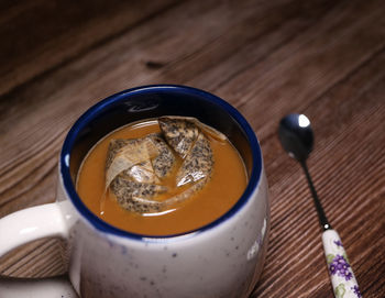 High angle view of tea in glass on table