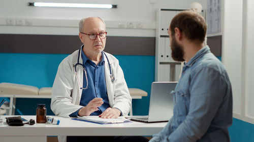 Female doctor working at clinic