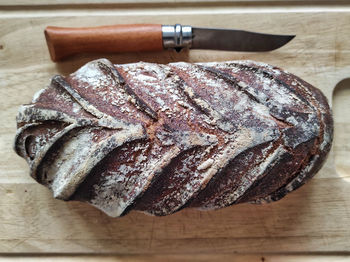 High angle view of bread on cutting board