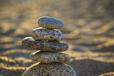 Close-up of stone stack on rock