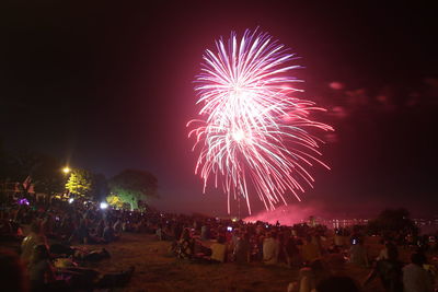 Firework display at night