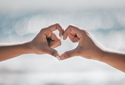 Cropped hand of woman holding hands