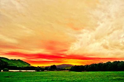 Scenic view of landscape at sunset