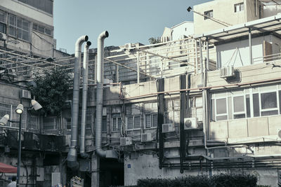 Low angle view of buildings against clear sky