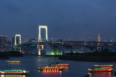 View of suspension bridge at night