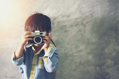 Portrait of man photographing