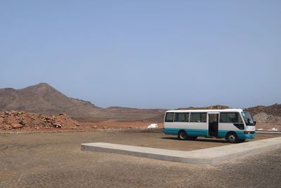 View of desert against clear sky