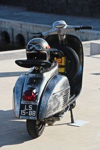 Close-up of vintage car on road