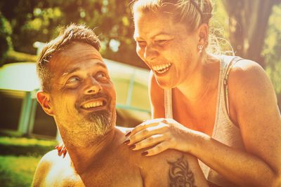 Portrait of smiling young man outdoors