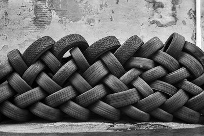 Used tires in an intricate braid.