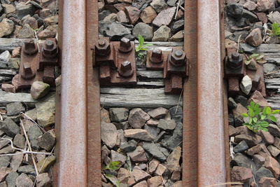 High angle view of rusty railroad tracks