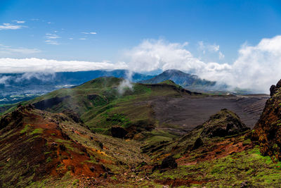 Scenic high angle view on mountains, aso town, and volcanic soil in kyushu, japan