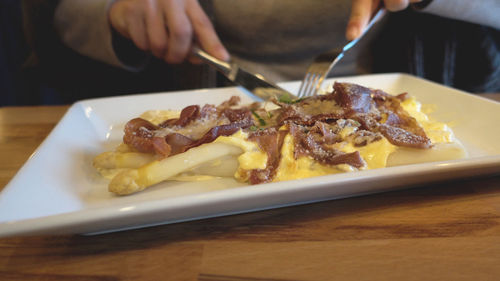 Close-up of meat in plate on table