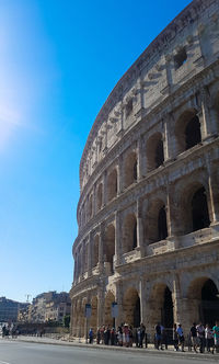 Low angle view of historical building against blue sky