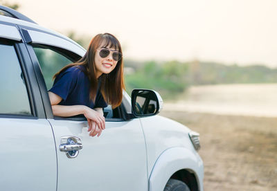 Portrait of woman wearing sunglasses