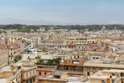 Rome and vatican city skyline from window of the vatican museum in cloudy day