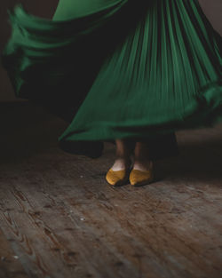 Low section of woman standing on floor